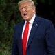 Donald Trump shouts at members of the media in October 2019.